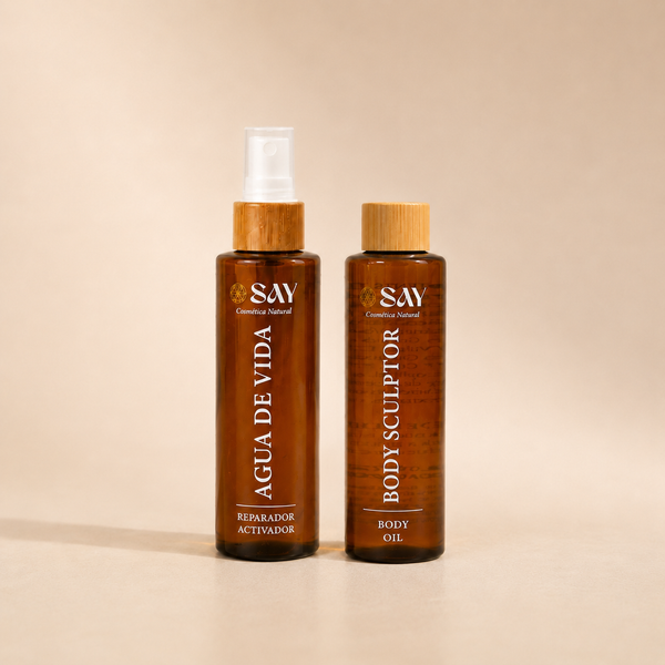 Agua de Vida y Body Sculptor de SAY Cosmética Natural en frascos ámbar con tapón de bambú